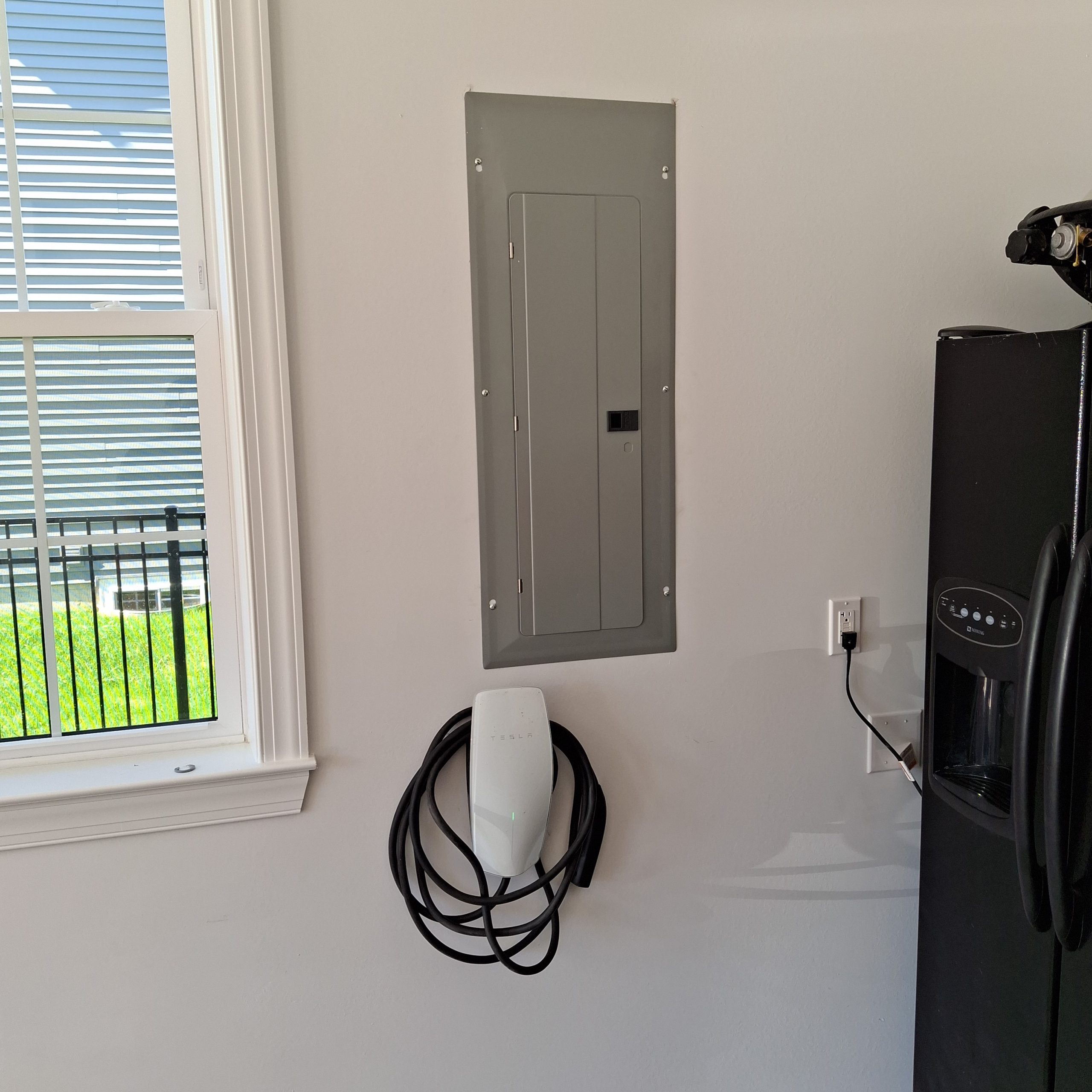 Tesla charger installed in garage